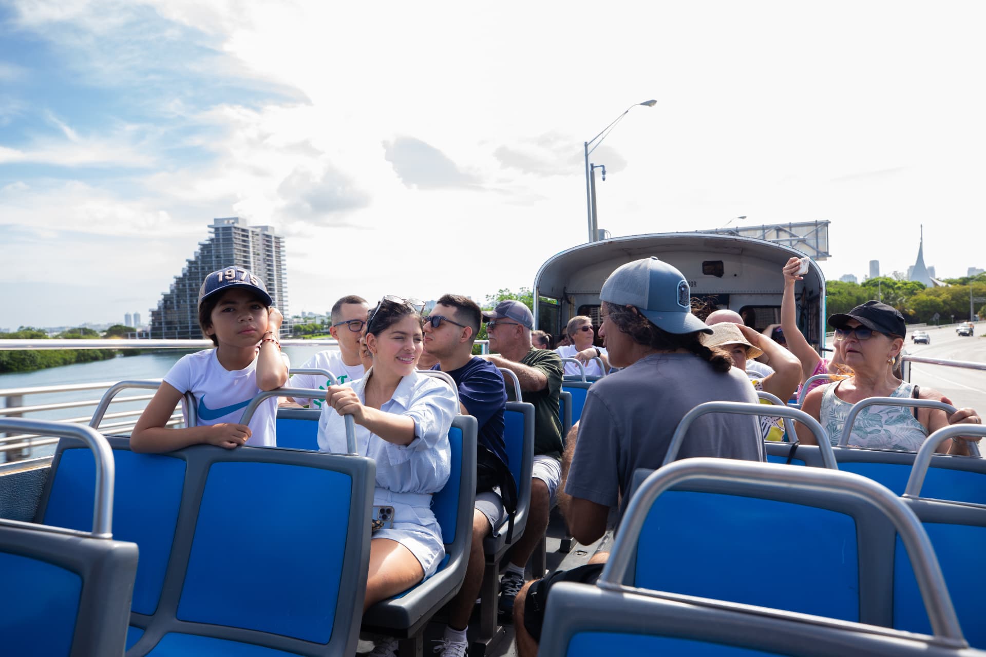 Guests riding the open-top Miami sightseeing tour